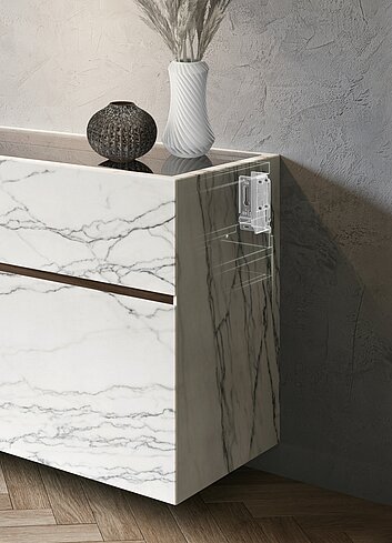 Schwebendes Möbeldesign auch bei hohen Gewichten: Der Schwerlastschrankaufhänger SAH 500 von Hettich ist einmalig schlank. Seine geringe Aufbauhöhe bietet neue Gestaltungsfreiheiten im Inneren des Korpus. Foto Hettich